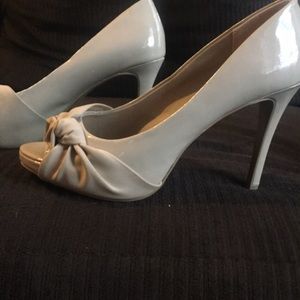 Nude peep toe pumps